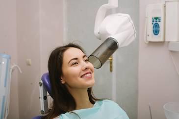 woman getting digital dentistry x-ray in Lihue